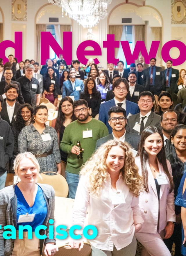 a group shot of all attendees at the GSM speed networking event in a hotel lobby