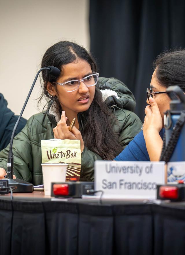 three UC Davis students participating in Biz Quiz