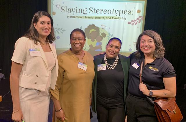 Leticia Garay standing with Alex Svensson and two guests from her panel