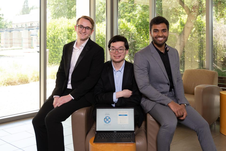 The 3-person SchedGo team pose in Gallagher Hall