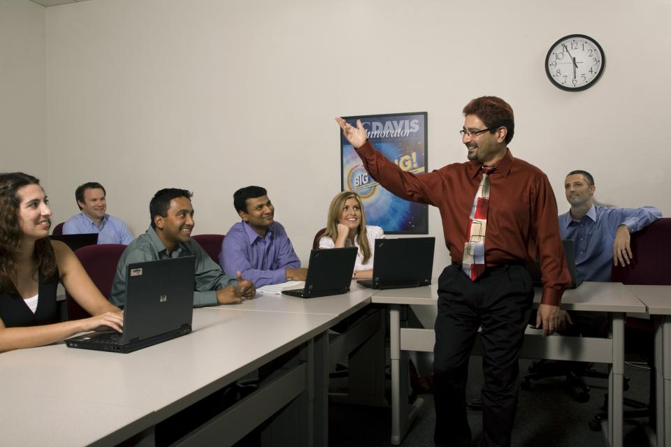 Professor Prasad Naik teaching Sacramento MBA students