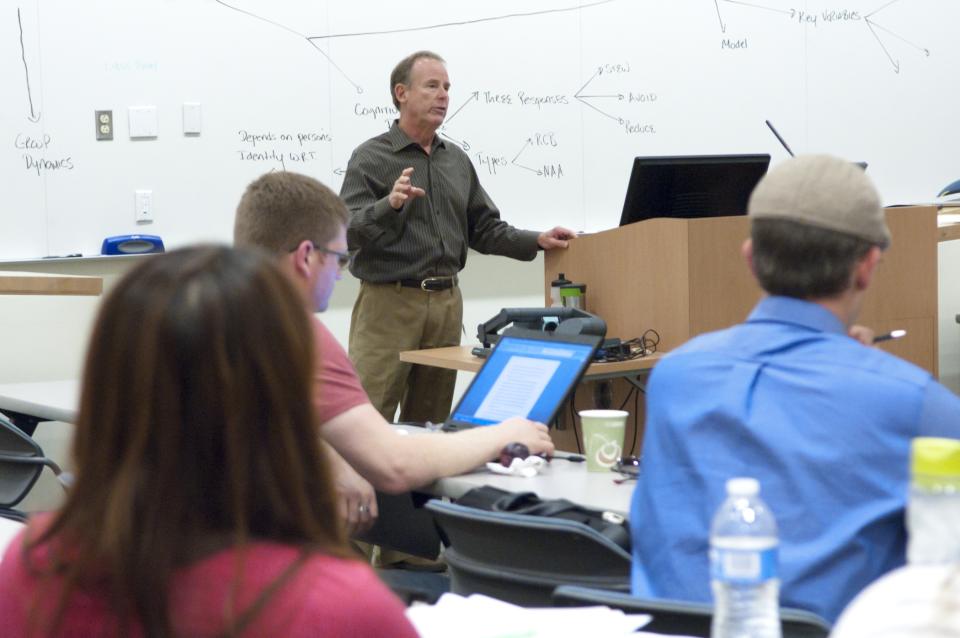 Professor Donald Palmer teaches class at the UC Davis Sacramento Education Building